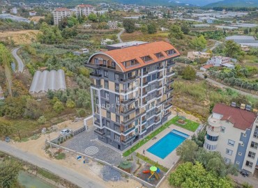 Элегантные двухкомнатные апартаменты, 50м², в новом комфортабельном комплексе в Авсалларе, Алания ID-18666 фото-18