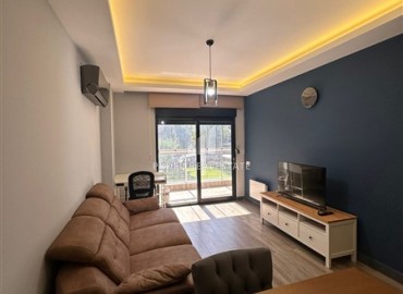 Элегантная квартира с одной спальней, 65м², в комплексе с бассейном в Махмутларе, Алания, в 200м от моря ID-18676 фото-3