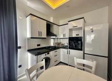 Двухкомнатная меблированная квартира, 50м², в новом комфортабельном комплексе, у моря в Каргыджаке, Алания ID-18677 фото-6