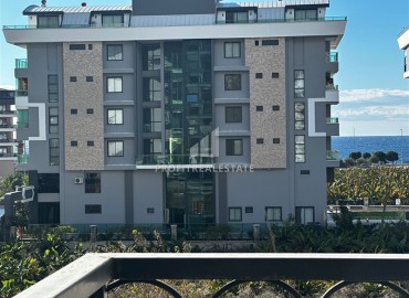 Двухкомнатная меблированная квартира, 50м², в новом комфортабельном комплексе, у моря в Каргыджаке, Алания ID-18677 фото-10