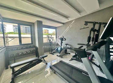 Двухкомнатная меблированная квартира, 50м², в новом комфортабельном комплексе, у моря в Каргыджаке, Алания ID-18677 фото-17