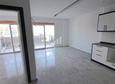 Двухкомнатная квартира, 50м², с чистовой отделкой в недорогой новостройке в Авсалларе, Алания ID-18679 фото-3