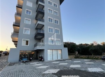 Двухкомнатная квартира, 50м², с чистовой отделкой в недорогой новостройке в Авсалларе, Алания ID-18679 фото-10