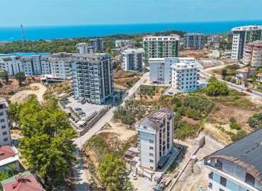 Двухкомнатные апартаменты, 42м², в комплексе премиум класса, у соснового леса в районе Авсаллар, Алания ID-18686 фото-16