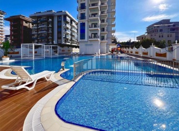 Уютная квартира с одной спальней, 57м², в новом комплексе премиум класса в 700 метрах от моря в Махмутларе, Алания ID-18687 фото-8