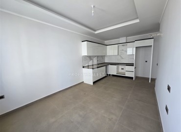 Апартаменты с одной спальней, 55м², в новостройке с отличной локацией в 300м от моря в районе Каргыджак, Алания ID-18689 фото-2