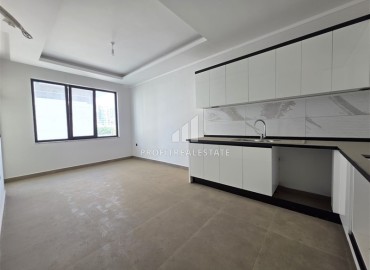 Апартаменты с одной спальней, 55м², в новостройке с отличной локацией в 300м от моря в районе Каргыджак, Алания ID-18689 фото-3