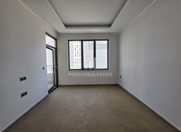 Апартаменты с одной спальней, 55м², в новостройке с отличной локацией в 300м от моря в районе Каргыджак, Алания ID-18689 фото-7