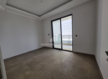 Апартаменты с одной спальней, 55м², в новостройке с отличной локацией в 300м от моря в районе Каргыджак, Алания ID-18689 фото-8