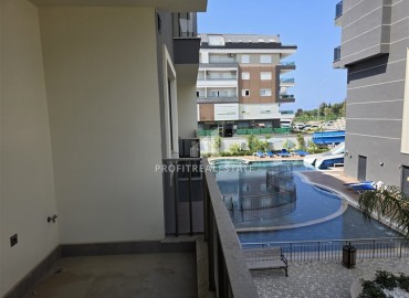 Апартаменты с одной спальней, 55м², в новостройке с отличной локацией в 300м от моря в районе Каргыджак, Алания ID-18689 фото-10