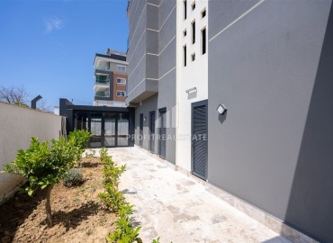 Апартаменты с одной спальней, 55м², в новостройке с отличной локацией в 300м от моря в районе Каргыджак, Алания ID-18689 фото-11