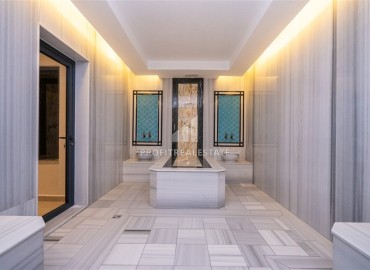 Апартаменты с одной спальней, 55м², в новостройке с отличной локацией в 300м от моря в районе Каргыджак, Алания ID-18689 фото-12