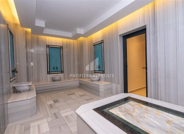 Апартаменты с одной спальней, 55м², в новостройке с отличной локацией в 300м от моря в районе Каргыджак, Алания ID-18689 фото-17