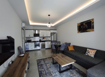 Элегантная двухкомнатная квартира, 55м², в комплексе с инфраструктурой, в 700м от моря в Махмутларе, Алания ID-18692 фото-2