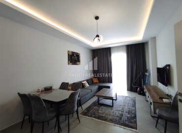 Элегантная двухкомнатная квартира, 55м², в комплексе с инфраструктурой, в 700м от моря в Махмутларе, Алания ID-18692 фото-4