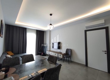 Элегантная двухкомнатная квартира, 55м², в комплексе с инфраструктурой, в 700м от моря в Махмутларе, Алания ID-18692 фото-5