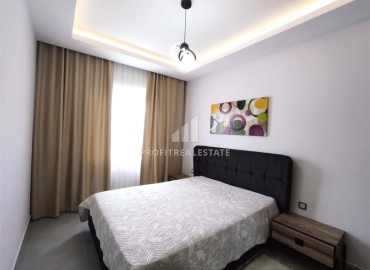 Элегантная двухкомнатная квартира, 55м², в комплексе с инфраструктурой, в 700м от моря в Махмутларе, Алания ID-18692 фото-6