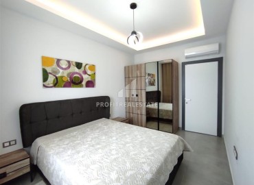 Элегантная двухкомнатная квартира, 55м², в комплексе с инфраструктурой, в 700м от моря в Махмутларе, Алания ID-18692 фото-7