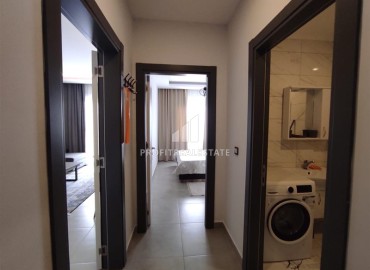 Элегантная двухкомнатная квартира, 55м², в комплексе с инфраструктурой, в 700м от моря в Махмутларе, Алания ID-18692 фото-8