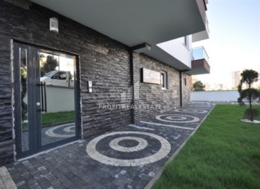 Элегантная двухкомнатная квартира, 55м², в комплексе с инфраструктурой, в 700м от моря в Махмутларе, Алания ID-18692 фото-12