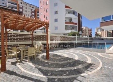 Элегантная двухкомнатная квартира, 55м², в комплексе с инфраструктурой, в 700м от моря в Махмутларе, Алания ID-18692 фото-13