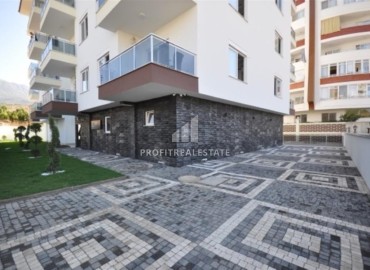 Элегантная двухкомнатная квартира, 55м², в комплексе с инфраструктурой, в 700м от моря в Махмутларе, Алания ID-18692 фото-14