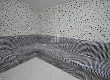 Элегантная двухкомнатная квартира, 55м², в комплексе с инфраструктурой, в 700м от моря в Махмутларе, Алания ID-18692 фото-16