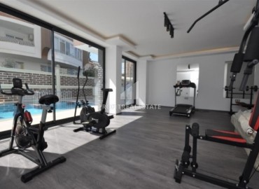 Элегантная двухкомнатная квартира, 55м², в комплексе с инфраструктурой, в 700м от моря в Махмутларе, Алания ID-18692 фото-18