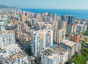 Просторная меблированная квартира с одной спальней, 75м², в 400м от моря в Махмутларе, Алания ID-18694 фото-1