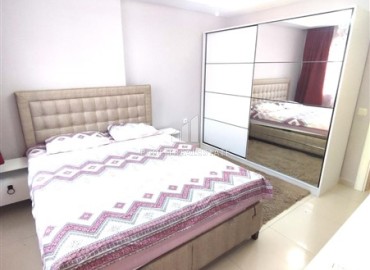 Просторная меблированная квартира с одной спальней, 75м², в 400м от моря в Махмутларе, Алания ID-18694 фото-8