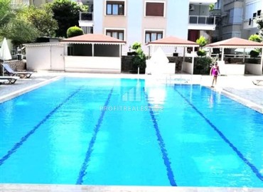 Просторная меблированная квартира с одной спальней, 75м², в 400м от моря в Махмутларе, Алания ID-18694 фото-11