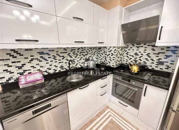 Элегантная квартира 1+1, 60м², с видом на горы в районе вторничного рынка в Махмутларе, Алания ID-18696 фото-9