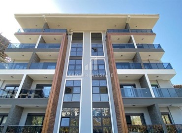 Двухкомнатная квартира, 55м², в резиденции с хорошей инфраструктурой в 500м от моря в Махмутларе, Алания ID-18703 фото-1