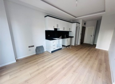 Двухкомнатная квартира, 55м², в резиденции с хорошей инфраструктурой в 500м от моря в Махмутларе, Алания ID-18703 фото-2