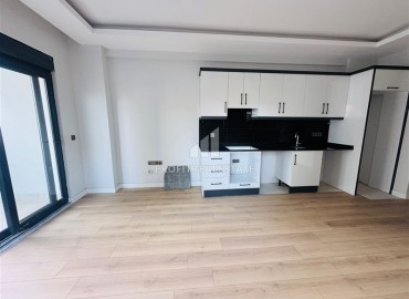 Двухкомнатная квартира, 55м², в резиденции с хорошей инфраструктурой в 500м от моря в Махмутларе, Алания ID-18703 фото-4