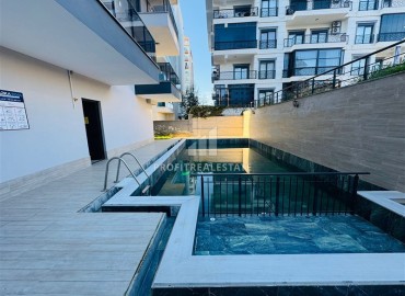 Двухкомнатная квартира, 55м², в резиденции с хорошей инфраструктурой в 500м от моря в Махмутларе, Алания ID-18703 фото-9