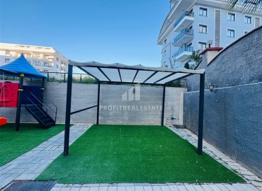 Двухкомнатная квартира, 55м², в резиденции с хорошей инфраструктурой в 500м от моря в Махмутларе, Алания ID-18703 фото-10