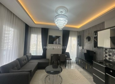 Готовая к проживанию, квартира 1+1, 60м², в современном комплексе с бассейном в Махмутларе, Алания ID-18506 фото-2