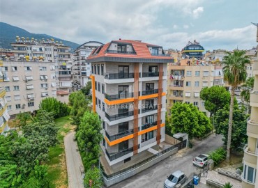 Центр Алании: новая квартира с одной спальней, 55м², в комплексе с парковкой, в 750м от Средиземного моря ID-18719 фото-1