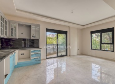 Центр Алании: новая квартира с одной спальней, 55м², в комплексе с парковкой, в 750м от Средиземного моря ID-18719 фото-2