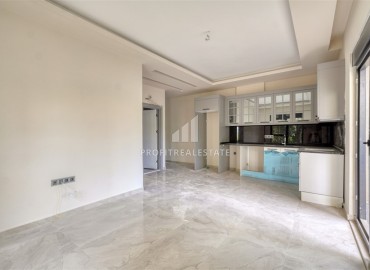 Центр Алании: новая квартира с одной спальней, 55м², в комплексе с парковкой, в 750м от Средиземного моря ID-18719 фото-4