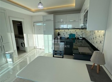 Меблированная двухкомнатная квартира, 65м², в комплексе премиум класса в 300м от моря в центре Махмутлара, Алания. ID-18720 фото-2