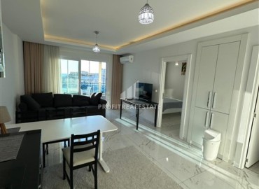 Меблированная двухкомнатная квартира, 65м², в комплексе премиум класса в 300м от моря в центре Махмутлара, Алания. ID-18720 фото-6