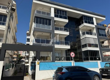 Двухкомнатная квартира, 55м², в 300м от пляжа Клеопатры в современной резиденции с бассейном, центр Алании ID-18721 фото-1