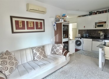 Симпатичные апартаменты 1+1, 50м², в комплексе с бассейном в 300м от моря в районе Оба, Алания по привлекательной цене ID-18726 фото-2