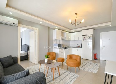 Элегантная двухкомнатная квартира, 55м², в современной резиденции у пляжа Клеопатры в центре Алании под ВНЖ ID-18730 фото-2