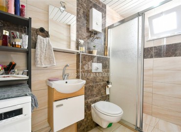 Элегантная двухкомнатная квартира, 55м², в современной резиденции у пляжа Клеопатры в центре Алании под ВНЖ ID-18730 фото-8