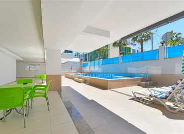 Элегантная двухкомнатная квартира, 55м², в современной резиденции у пляжа Клеопатры в центре Алании под ВНЖ ID-18730 фото-11