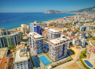 Luxury real estate at the initial stage of construction in the area of Alanya - Tosmur, with interest-free installments ID-10258 фото-1