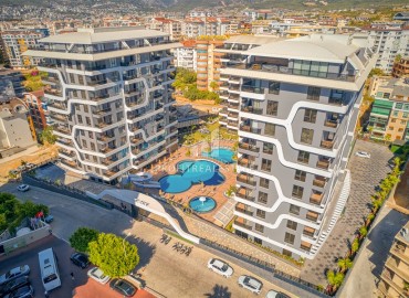 Luxury real estate at the initial stage of construction in the area of Alanya - Tosmur, with interest-free installments ID-10258 фото-2